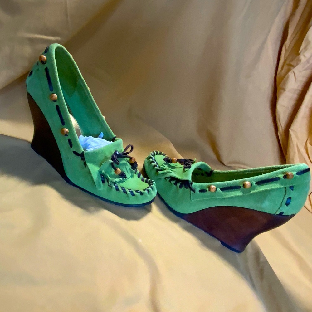Never-worn high-heeled moccasin wedges